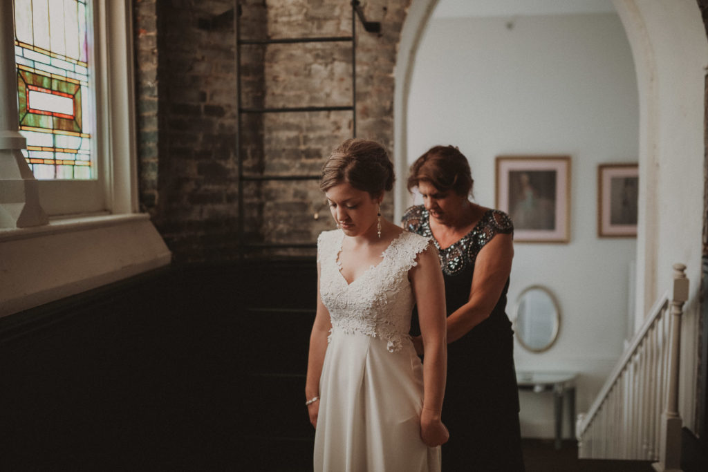 bride getting ready in bridal suite at the transept in otr